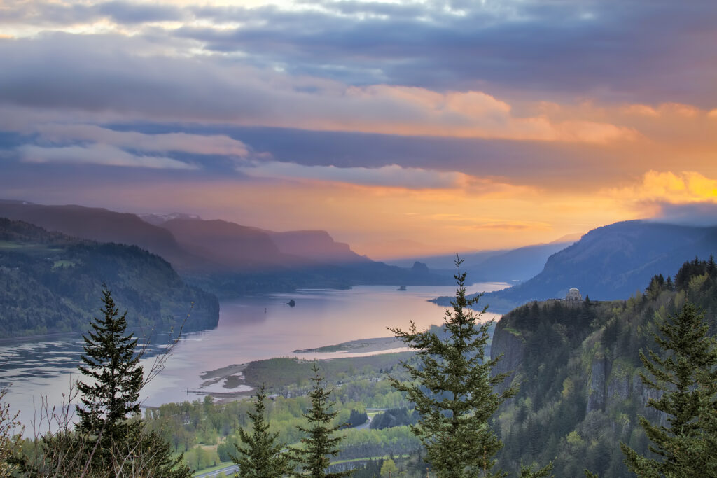Sunrise Over Vista House on Crown Point at Columbia River Gorge in Oregon with Beacon Rock in Washington State