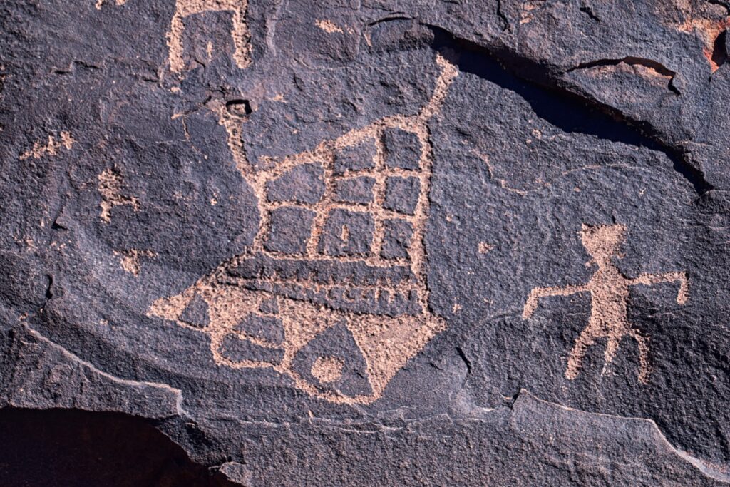 Paiute petroglyphs on rock wall. 